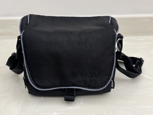 Nikon black camera - camera, bag