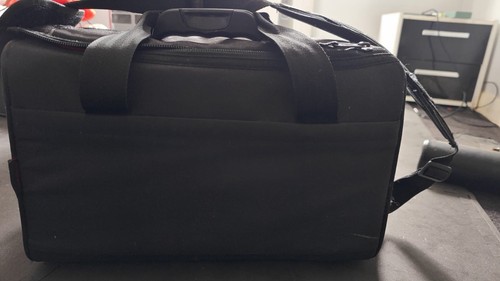 Nearly new petrol - new, bag