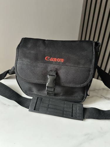 Canon black camera - canon,